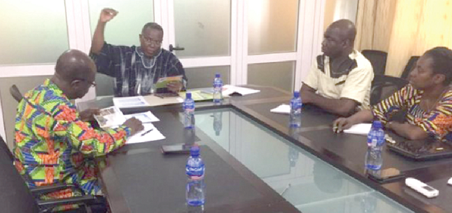 Minister designate for Planning, Prof Gyan Baffour, (left) in a meeting with the Chairman of the NDPC, Dr Nii Moi Thompson (2nd left) and other members of the NDPC